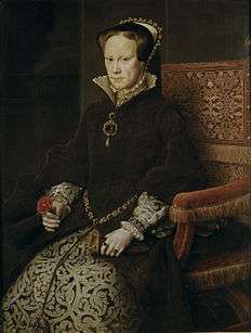 A formal seated portrait in the Spanish style of Mary I. She has a sallow fleshy face with reddish-brown hair and light eyes. Her mouth is firmly set and her eyes wary. She wears a dress of fine dark brown fur over a brocade underskirt heavily patterned in the Florentine style. Her cap is bordered with jewels and pearls. Much of her jewellery is grey pearls. She holds a pair of kid gloves and a rose.
