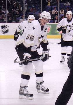 Mario Lemieux, wearing number 66, playing a game with the Pittsburgh Penguins
