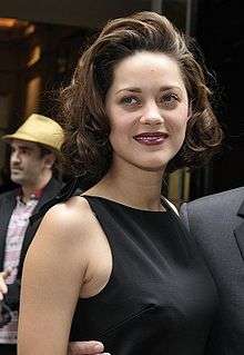 Photo of Marion Cotillard attending the Haute Couture Autumn-Winter fashion show in 2009.