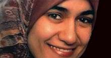 Marwa El-Sherbini wearing an Islamic headscarf and smiling