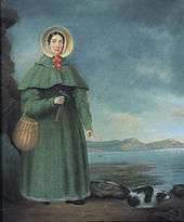 portrait of woman with bonnet, rock hammer, and small dog