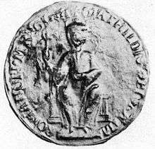 Seal image of a seated figure circled by writing.