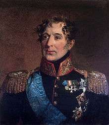 Painting of a middle-aged man with curly hair and sideburns. He wears a dark military coat with a high collar and epaulettes and a number of decorations.