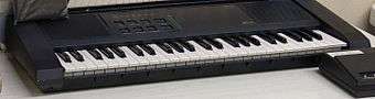 A photo of a Miracle Piano Teaching System keyboard