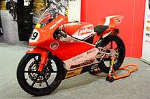 Red and White Moriwaki MD250H racing motorcycle two-fifty cc