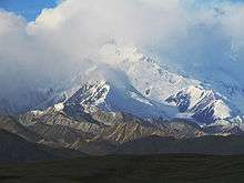 The top of Denali is shrouded in clouds