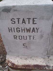 A stamp on a bridge reading State Highway Route 5
