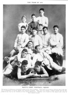 A black and white picture of men in white uniforms posing for a picture
