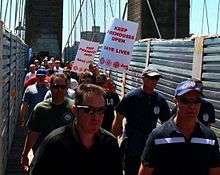 Thousands of New Yorkers stream across Brooklyn Bridge to close 20 FDNY fire companies in June 2011