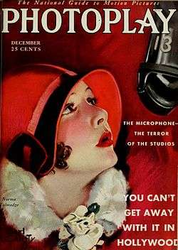Magazine cover with illustration of a young woman wearing a form-fitting red hat staring up at a suspended microphone. Accompanying text reads, "The Microphone—The Terror of the Studios", and, in larger type, "You Can't Get Away With It in Hollywood".