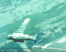 Blurry Gun camera photo shows a North Vietnamese MiG-17-fighter.