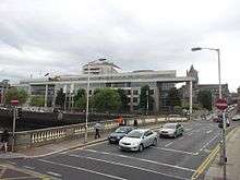 The O'Donovan Rossa Bridge with traffic flowing, with the Dublin City Council building in the background