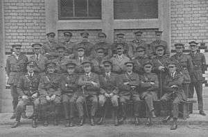 Formal group portrait of men in Army uniform