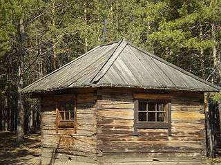 An Old Believers chapel in Siberia by the woods