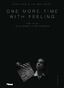 Uppercase white text reads "Nick Cave & the Bad Seeds", "One More Time with Feeling" and "the film, in cinemas 8 September" against a black background. Below the text, a man in a white shirt and black suit jacket stares upward; a clapperboard with several instances of handwritten technical information is visible to the right of him. In the bottom-left corner black uppercase text on a white background reads "Picturehouse Entetainment"; in the bottom-right corner "NickCave.com" is written in uppercase white text against the black background.