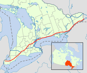 A map of the southern portion of the Canadian province of Ontario and environs, with the 400-series highway network superimposed. Highway 401 is shown as a red line, crossing from the lower left (Windsor–Detroit border) to the upper-right (Ontario–Quebec border, west of Montreal).