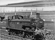A pannier tank locomotive adapted for underground working. The pannier tank shown is shorter than usual, starting behind the smokebox and after about a third of its length extends down to the footplate. At the front there is a pump and extra pipe work, which also extends above the boiler.