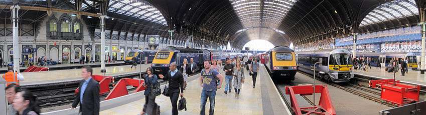 The platforms inside the train shed at London Paddington station. Three of the platforms are occupied by First Great Western High Speed Trains, while another two have Heathrow Express units