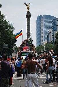 Photo from gay-pride parade in Mexico City, with rainbow flag