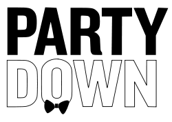 The word 'Party' written in black, underneath the word 'Down' written in white with a black outline, and a black bowtie at the base of the letter 'O' in the word 'Down'.