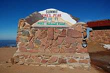 The sign constructed of stones at the summit of Pikes Peak, Pike National Forest, Colorado