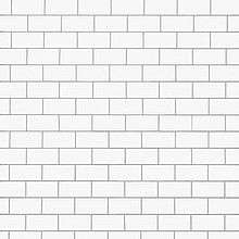 The album cover, a plain white brick wall
