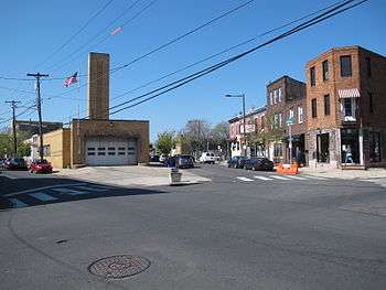 Point Breeze Avenue northern terminus.  Federal Street running west is in the foreground.  20th Street is on the left, Point Breeze Avenue on the right.  Philadelphia Fire Department Engine Company 24 visible at the corner with the Philadelphia Police Department 17th District office on the far left.