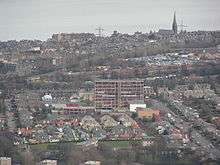 A view of Portobello High School from nearby Arthur's Seat