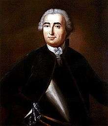 A half-length portrait of Montcalm, dressed mainly in black, but also wearing a metal breastplate, against a dark brown background.  He is wearing a powdered wig.