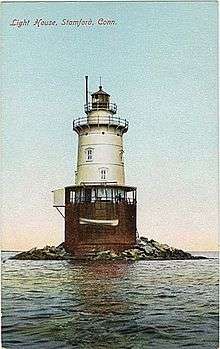 A postcard with a photograph of the Stamford Harbor Ledge Light