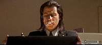 Film screenshot of John Travolta as Vincent Vega