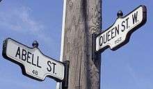  Street signs for Queen Street West and Abell Street, in West Queen West.