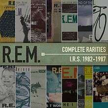 Several R.E.M. album and single covers laid on top of one another