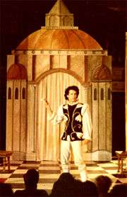 A photograph of Hanks on the stage performing as Callimaco in the play, The Mandrake, at the Riverside Shakespeare Theater
