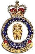 Crest of 77 Squadron, Royal Australian Air Force, featuring a lion and the motto "Swift to Destroy"