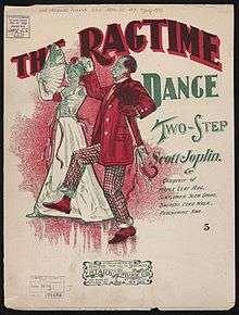 A stereotyped African-American couple are shown dancing in a drawing on the front cover of the sheet music