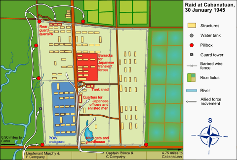 Overhead map of the layout of the prisoner camp. Arrows indicate the directions the American soldiers attacked the camp, and a legend at the right indicates the types of buildings located in the camp
