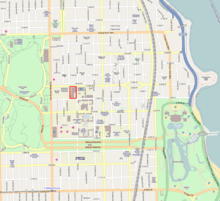 a street map with a portion of a block designated with red borders.  The map also has several large green areas designating undeveloped land.