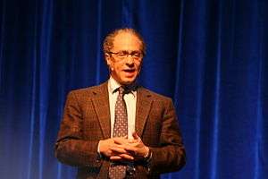 Picture of Ray Kurzweil giving a speech