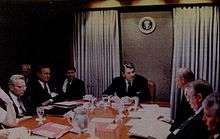 Martin between Presidents Bush and Reagan in the Situation Room