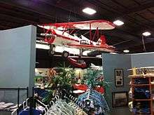 One of the famous Red Baron Pizza aerobatic team's Stearmans on display.