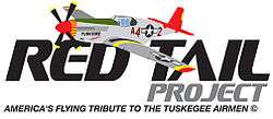Logo of the Red Tail Project with the words: "RED TAIL" in black letters above the left-aligned word PROJECT in gray letters which are half as tall all of which is above a motto reading: "AMERICA's FLYING TRIBUTE TO THE TUSKEGEE AIRMEN" (c), written in all caps, in a single line the same width as the first and much smaller letters. A single nosed-propeller aircraft with a red tail and nose, black propellers, gray base paint, black letters reading A42. The "4" and "2" are separated by a United States roundel in black with a central white star. The roundel is also visible on the tops of the aircraft's wings.