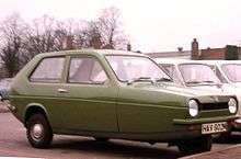 an early model reliant robin in olive colour