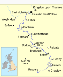 Map of the River Mole, marked in dark blue, running in an S-shape.  Towns and some villages are named.  At the top of the map, a stretch of the River Thames between Weybridge and Kingston is shown in light blue.