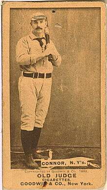 A sepia-toned baseball card of a 19th-century ballplayer holding a bat