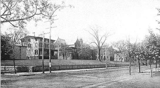 1901 black and white photograph of a city street, Rutgers College academic buildings on the left
