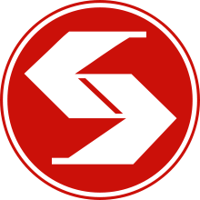 Angled white "S" on a red circular background with a white and red double border.