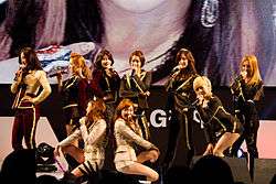 A photograph of Girls' Generation performing at the LG Cinema 3D World Festival in 2012