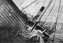 Vestris listing to starboard so badly that part of the upper deck was awash