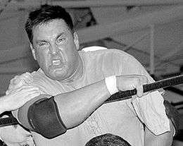 A picture of wrestler Johnny Gunn in the ring.